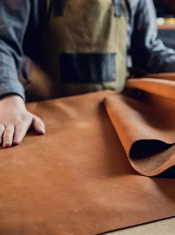 Dispersant for leather tanning