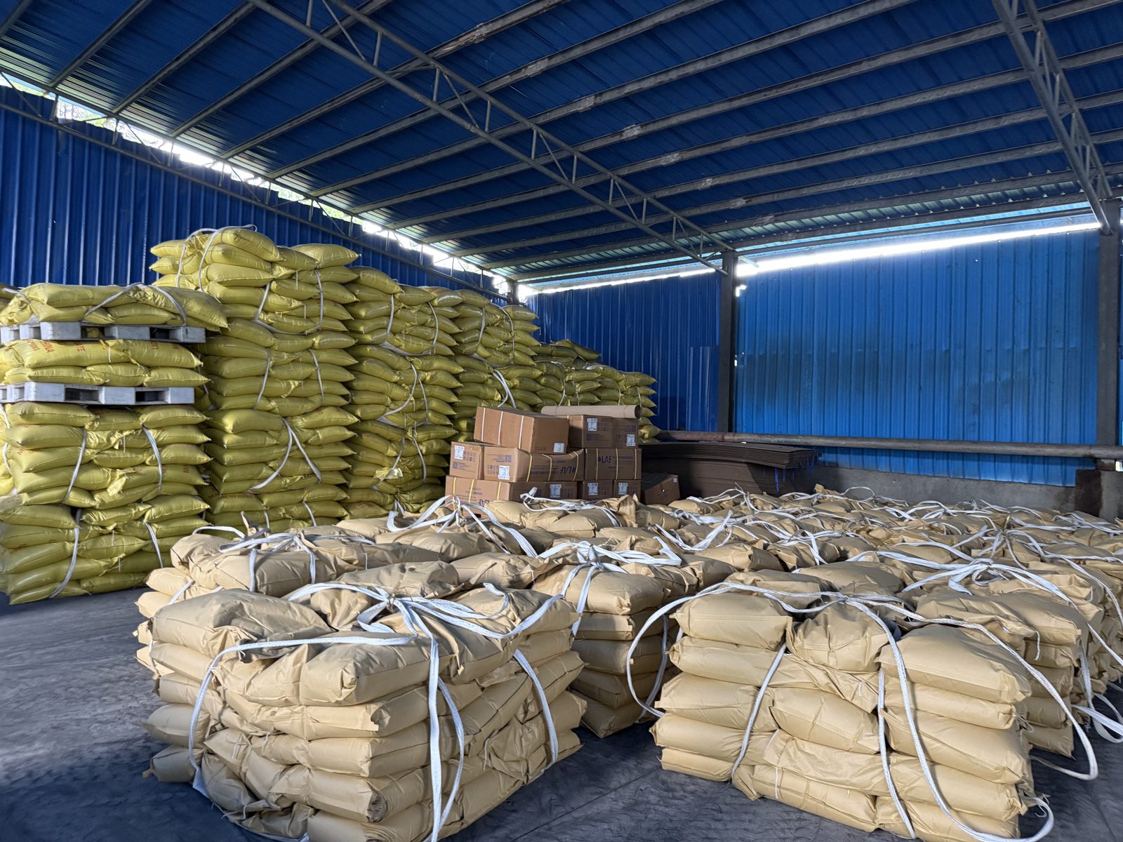 Stacks of bagged lignosulfonate powder ready for shipment